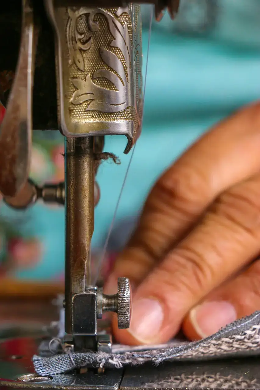 Garment being stitched by a tailor at Nazir Textile
