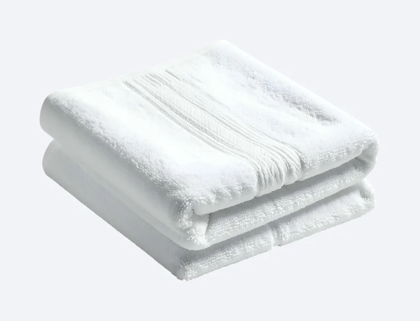 Folded white 100% cotton terry towel made by Nazir Textile
